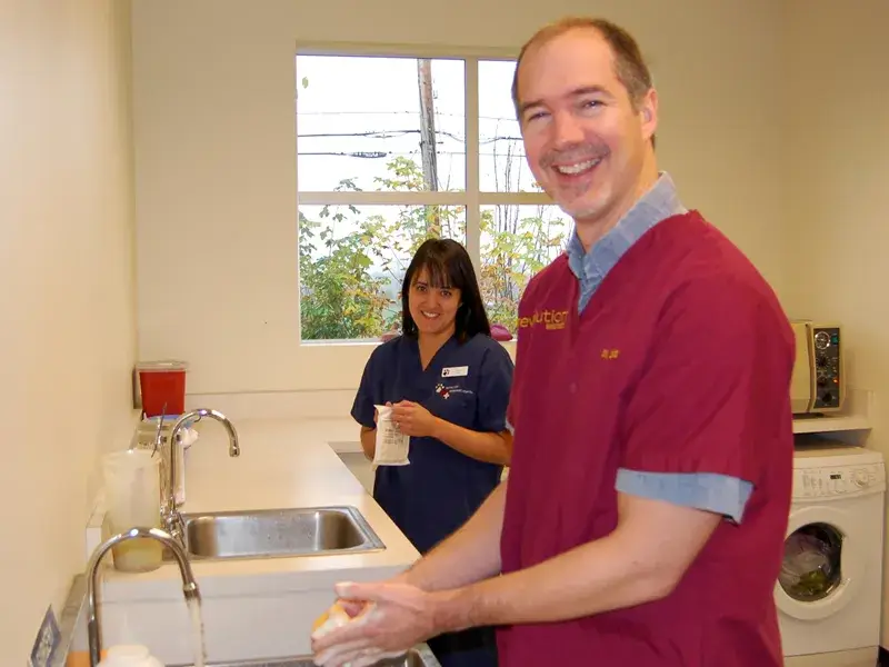 Dr. DeMaris scrubbing for surgery in our pack prep and sterilization room...